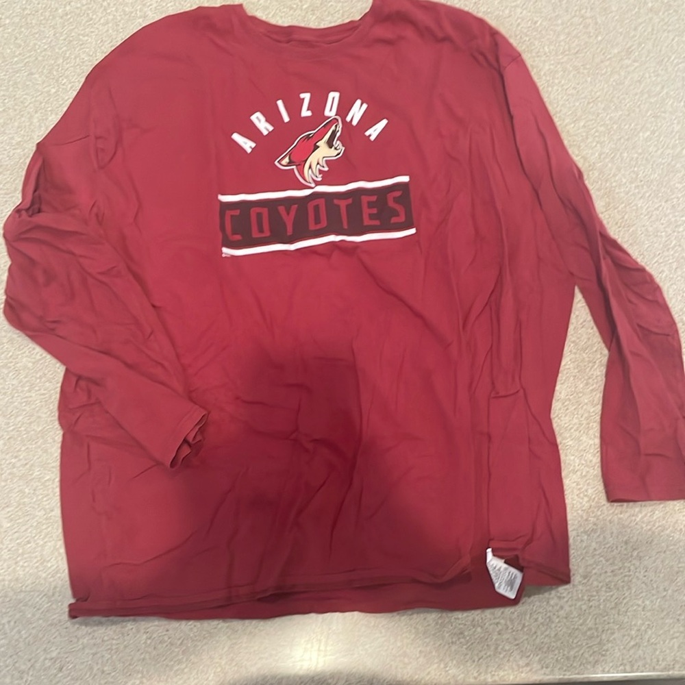 men’s coyotes long sleeve size 4XL.